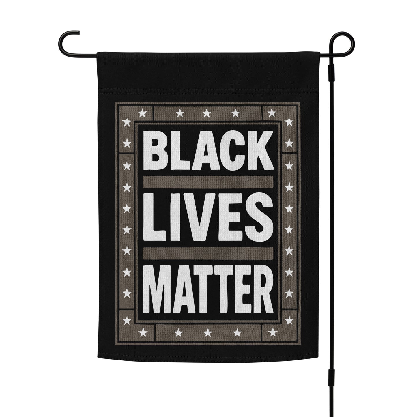 Black Lives Matter garden flag displayed on a flag stand, featuring bold white lettering and star accents.