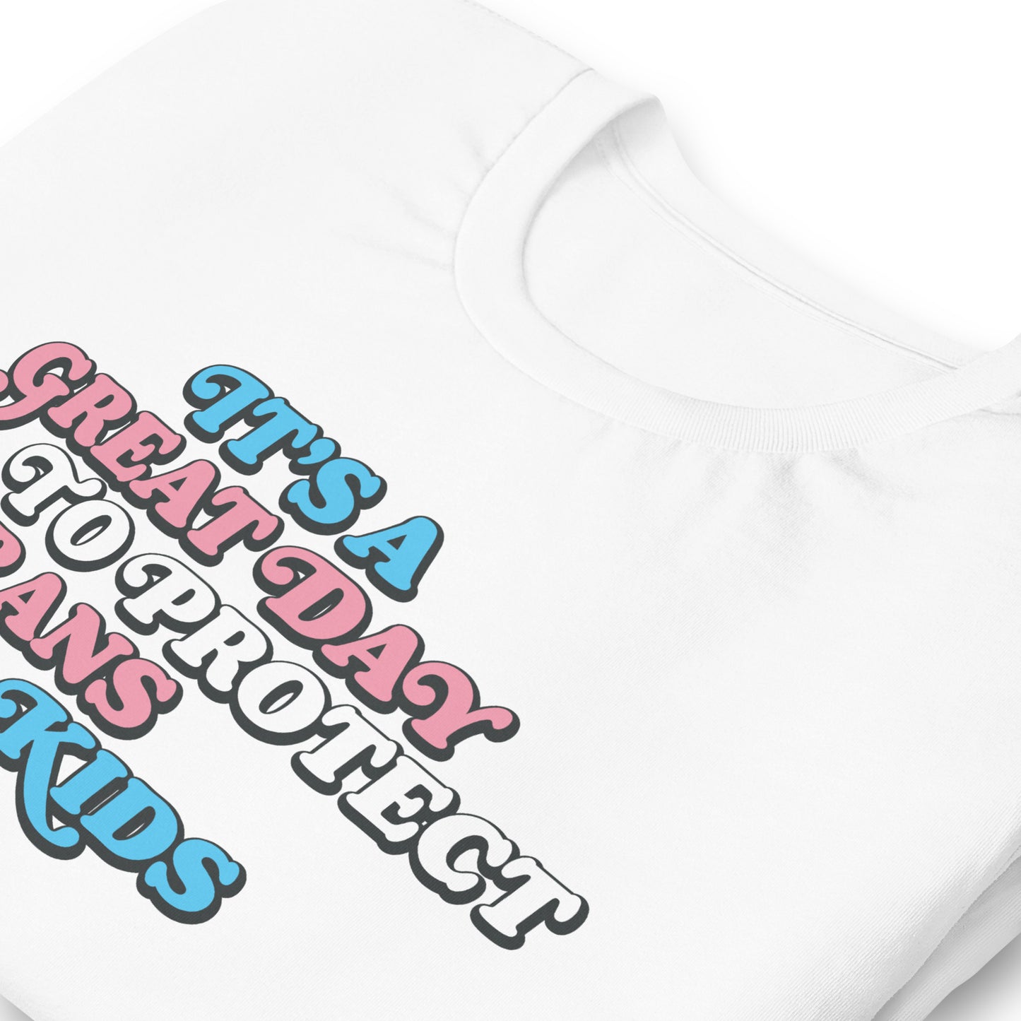 Close-up of the bold Protect Trans Kids design on t-shirt.