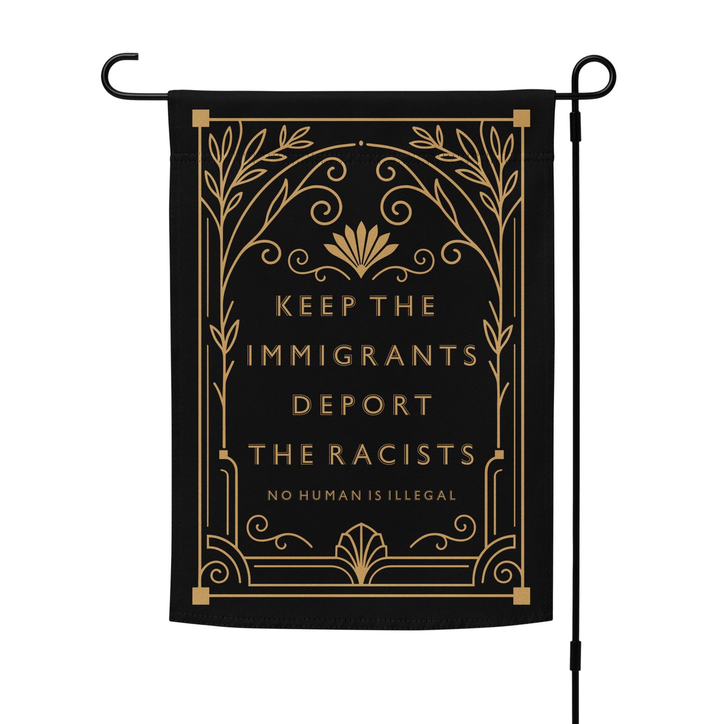 Keep The Immigrants Deport The Racists Garden Flag displayed on a stand