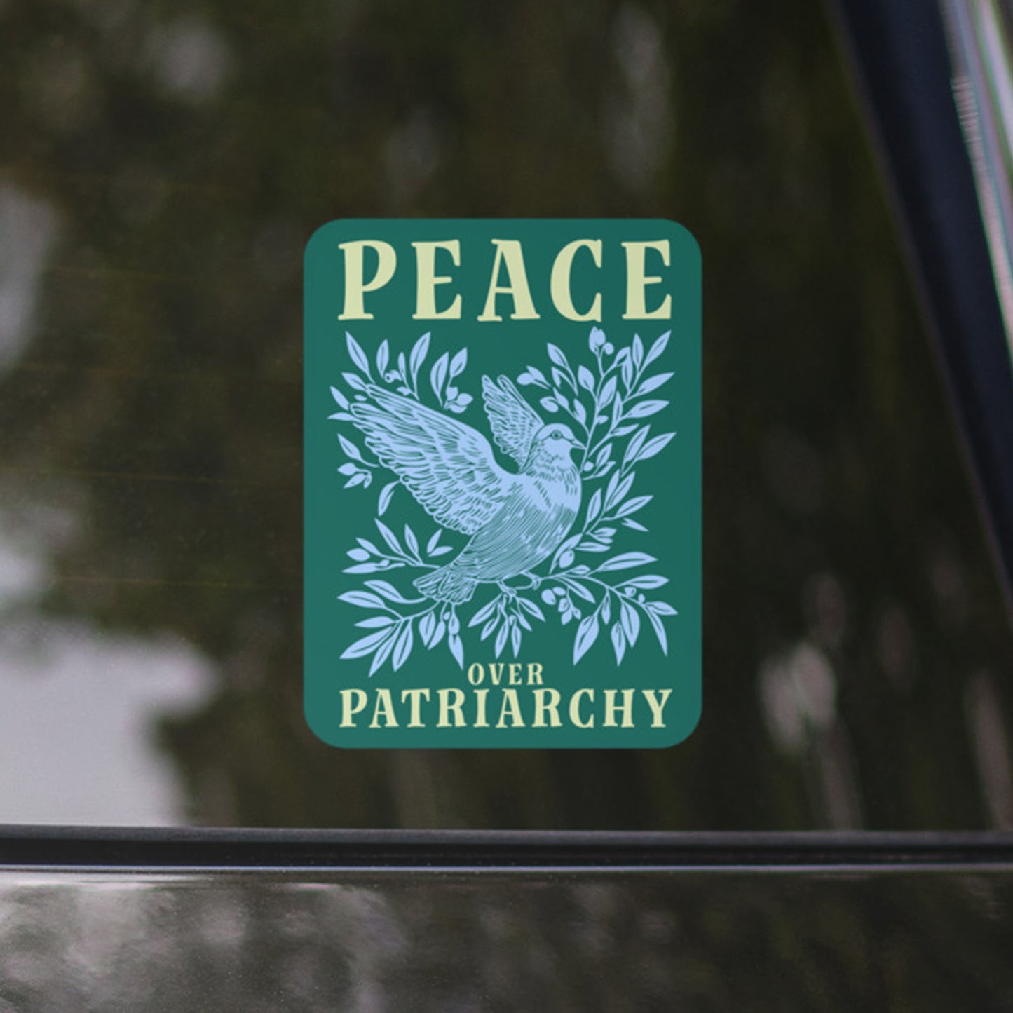 Close-Up of Design: Detailed look at the "Peace Over Patriarchy" message on the sticker.