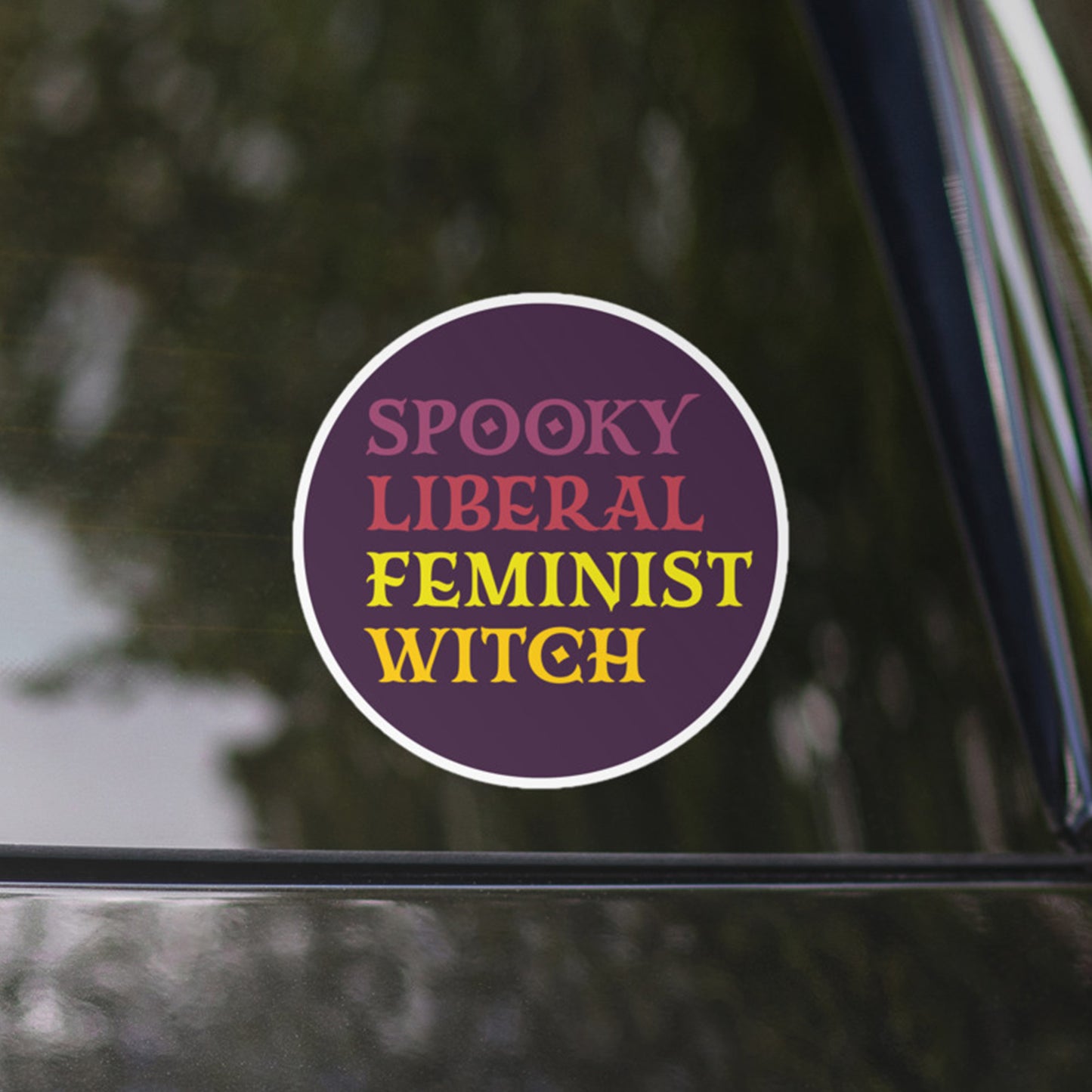 Close-Up of Design: Detailed close-up of the liberal feminist witch graphic.
