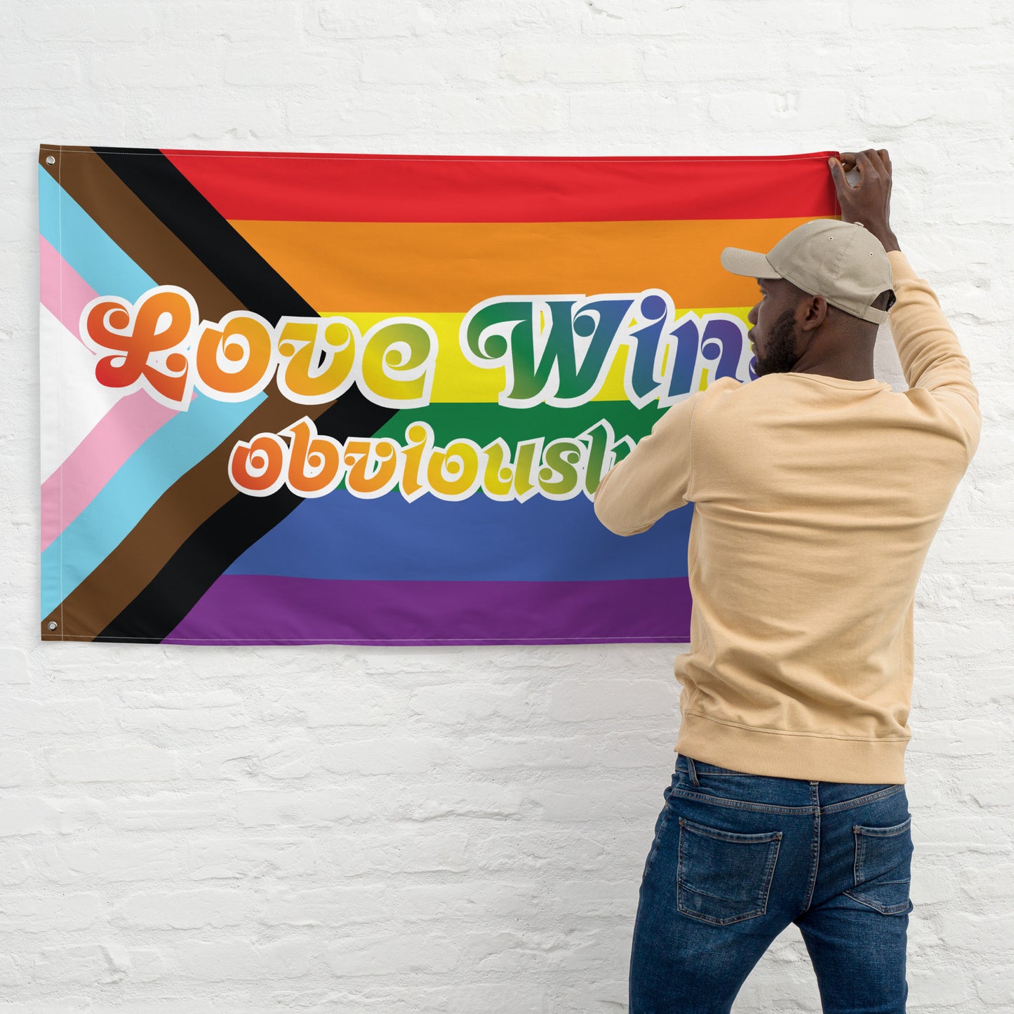 Lifestyle Image: "Model proudly holding the Love Wins Obviously LGBTQ+ Flag."