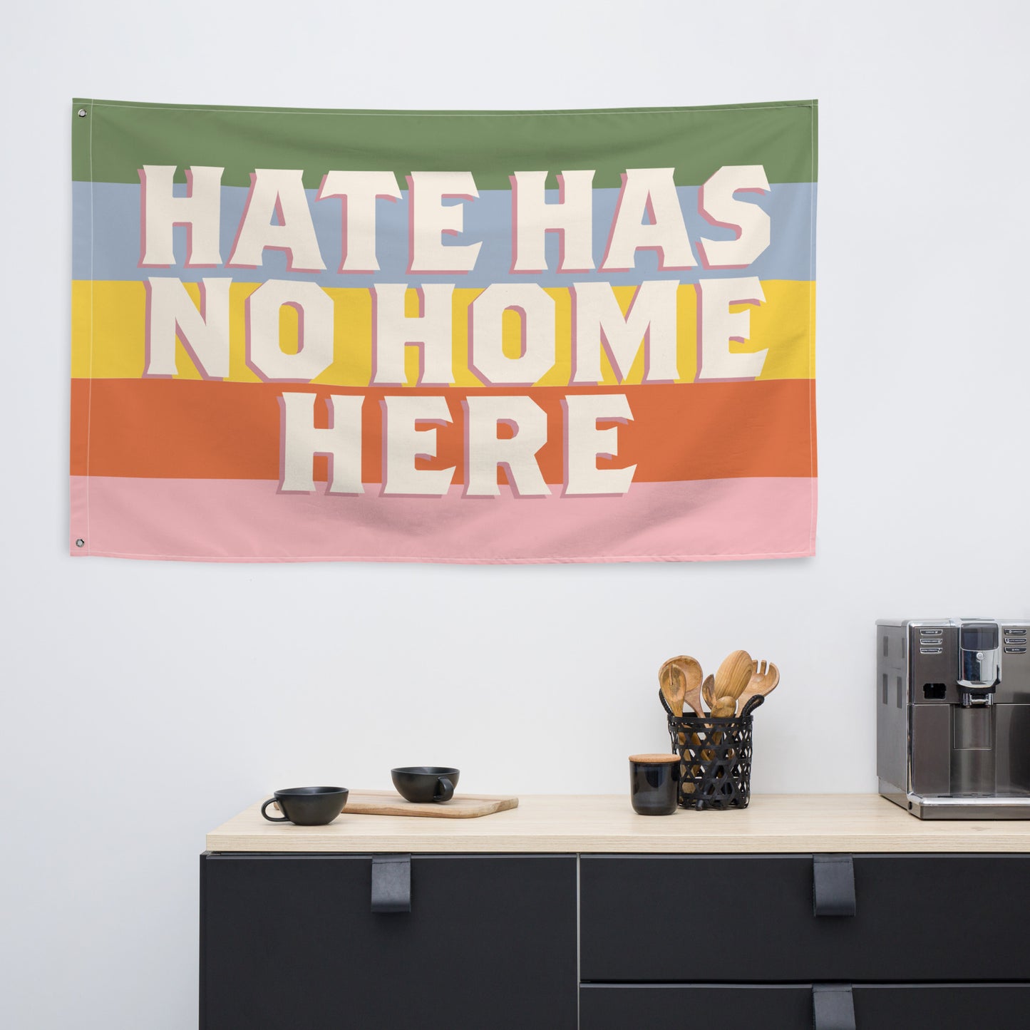 Front View Image: Equality-focused flag with bold Hate Has No Home Here lettering.
