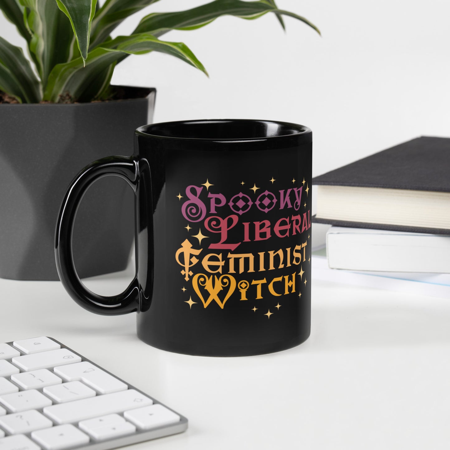 11 oz black mug with Spooky Liberal Feminist Witch design.