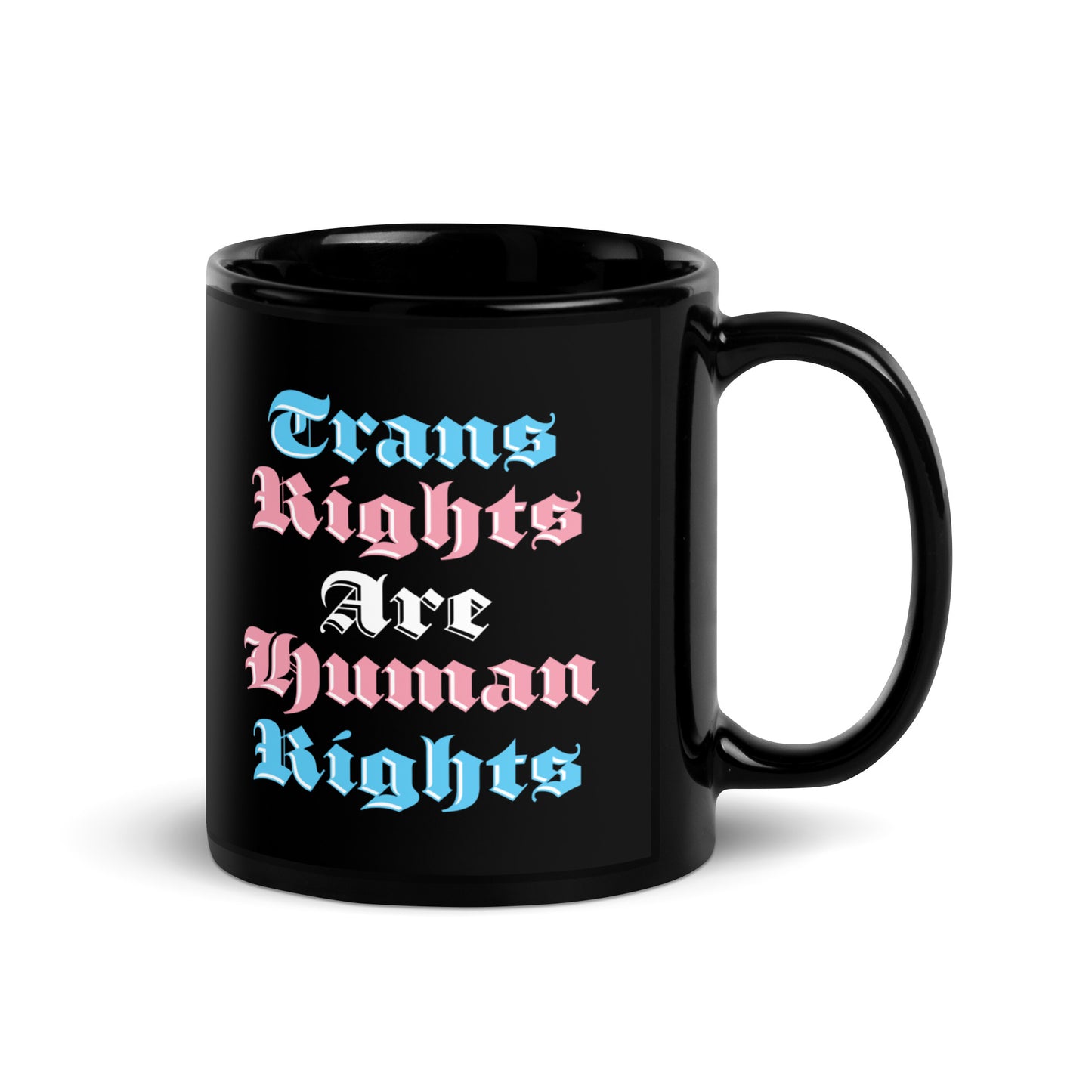 Front view of the 11 oz Trans Rights Are Human Rights Black Mug on a table