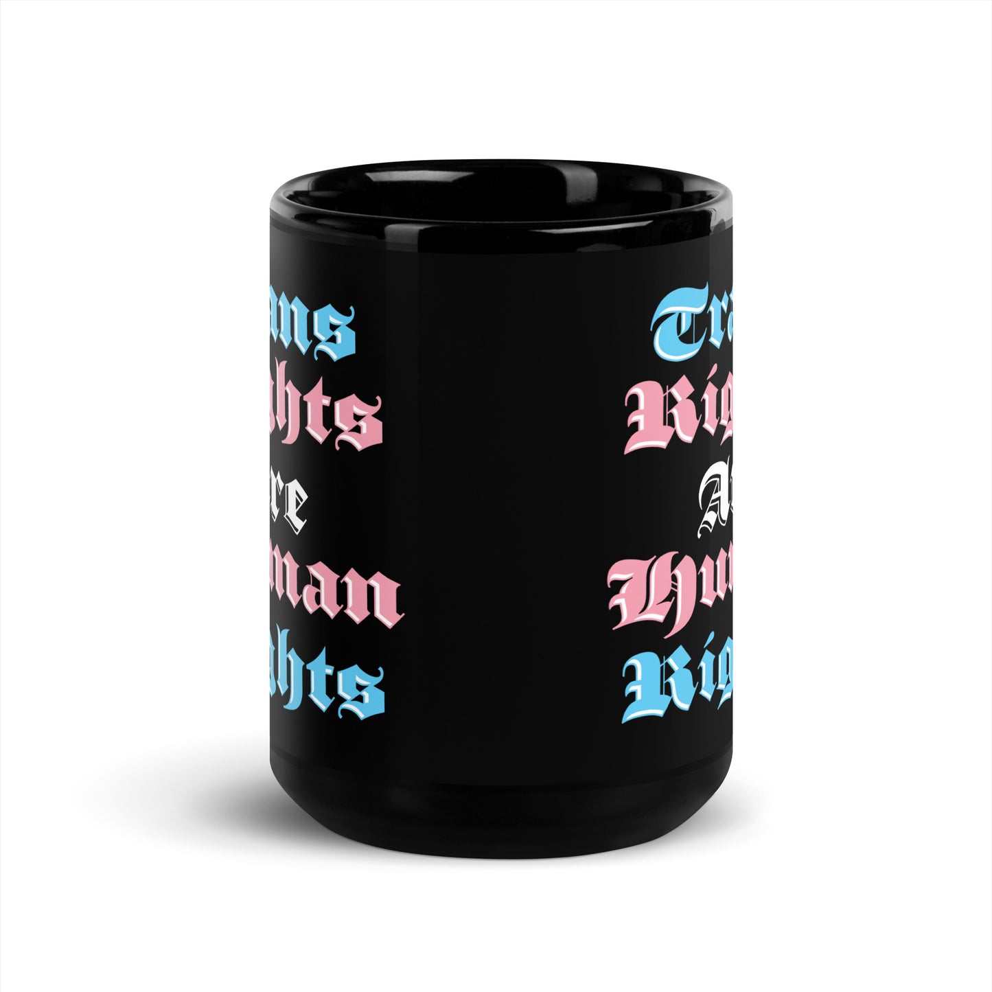 Front view of the 15 oz Trans Rights Are Human Rights Black Mug on a table
