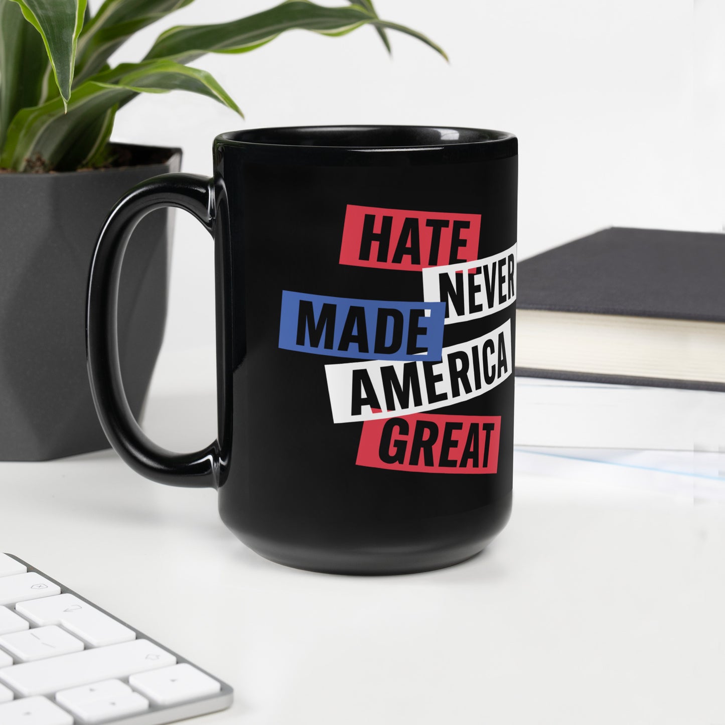 Front View Image: the 15 oHate Never Made America Great Black mug with bold text design.