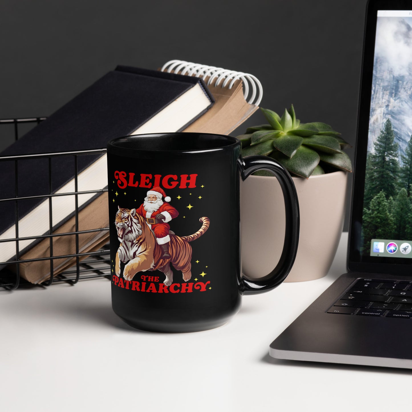 15 oz Black mug featuring Santa riding a tiger with the slogan "Sleigh The Patriarchy."