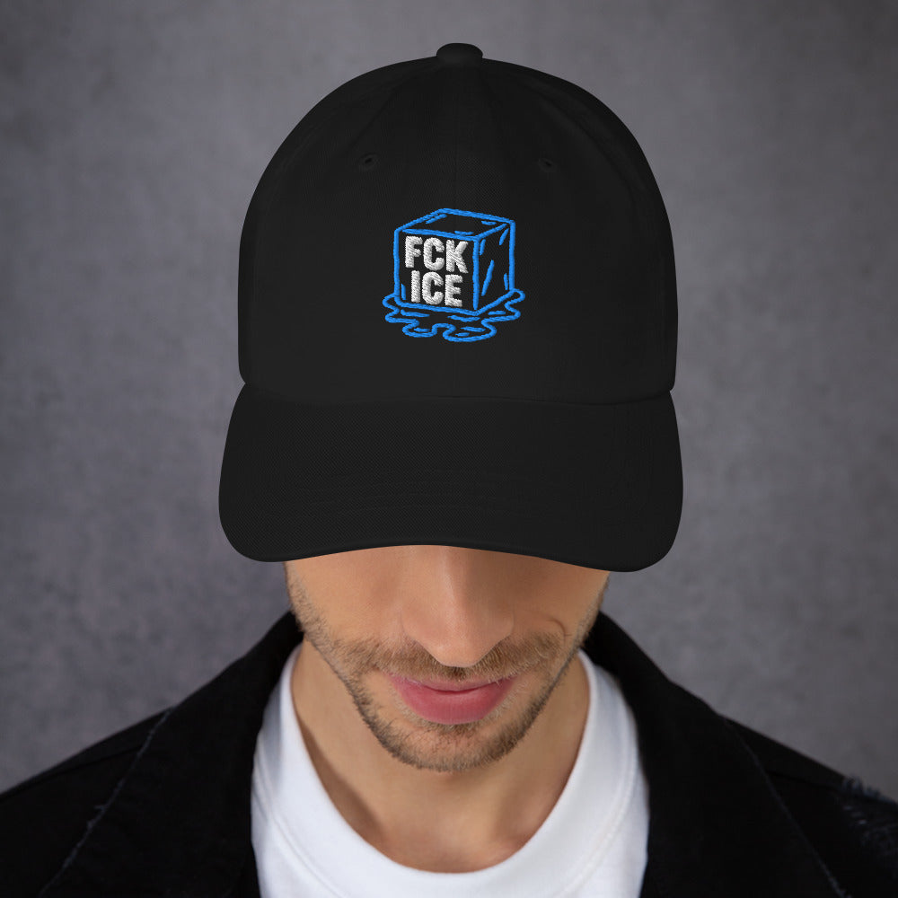 Lifestyle Image: Model wearing embroidered F*CK ICE melting cube graphic protest hat with abolitionist design