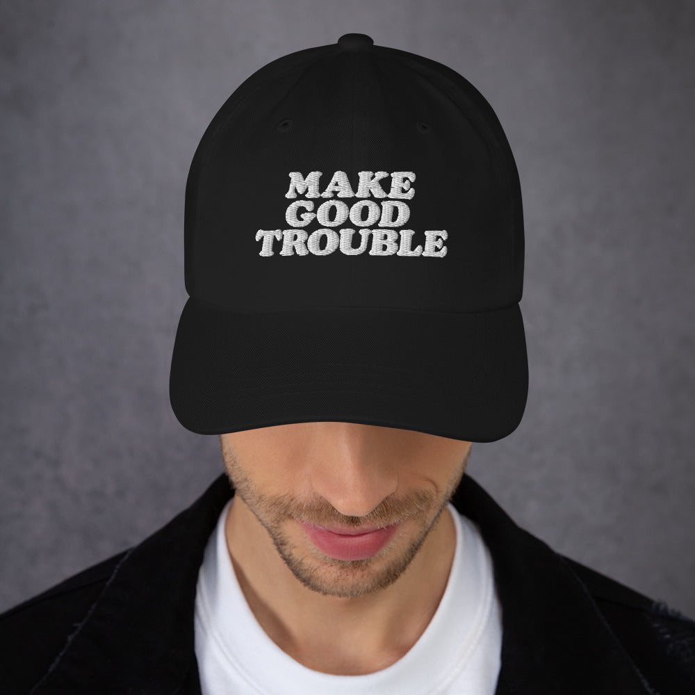 Model wearing the John Lewis "Make Good Trouble" Quote Social Justice Dad Hat