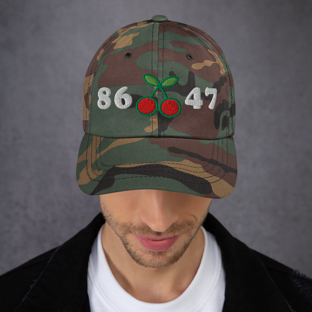 Lifestyle Image: Activist Wearing 8647 Anti-Trump Cherry Hat