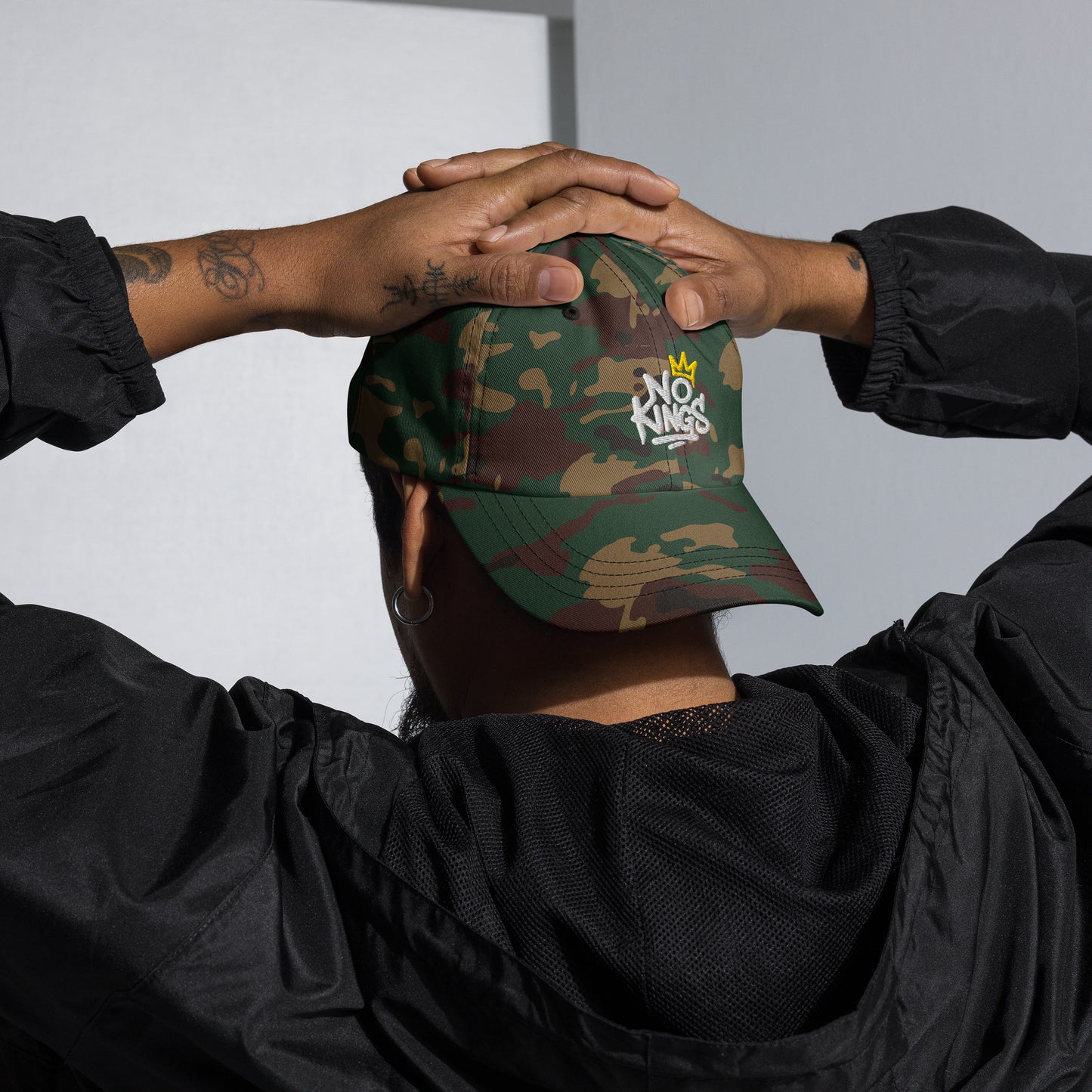 Life Style Design: Embroidered "No Kings" graffiti text with crown detail