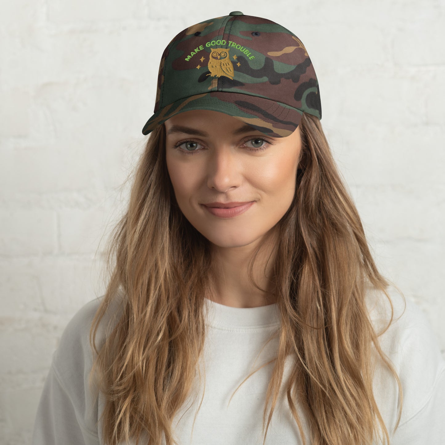 Lifestyle Image: Woman wearing the Embroidered “Make Good Trouble” dad hat