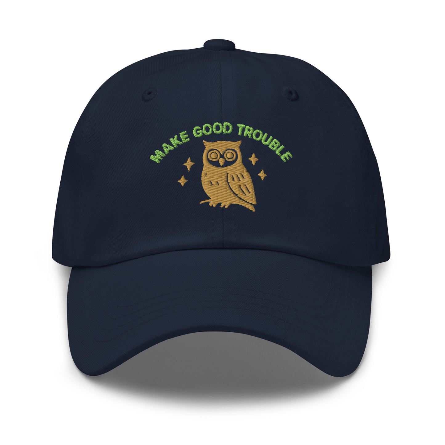 Front View Image: Front view of embroidered dad hat with “Make Good Trouble” text and golden owl