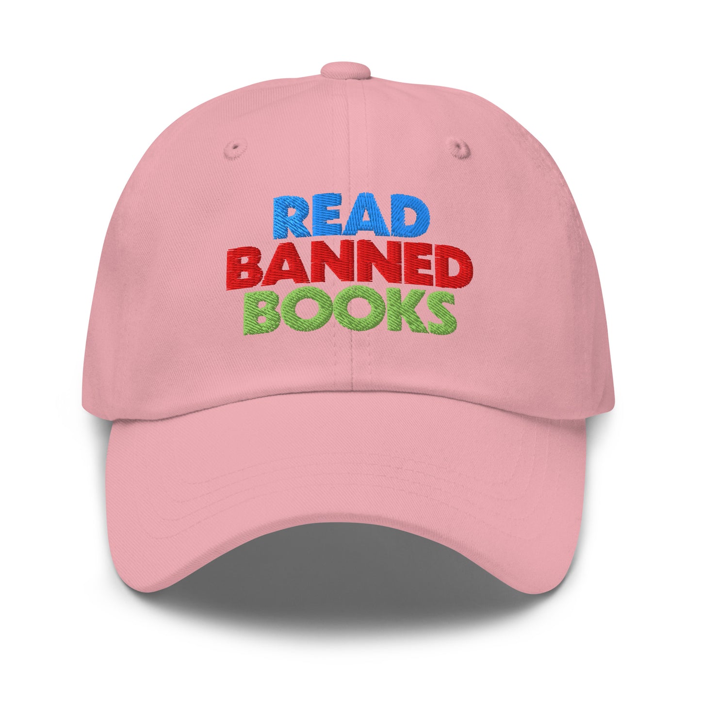 Light pink Read Banned Books dad hat with rainbow-inspired embroidery. A soft tone for a powerful cause.