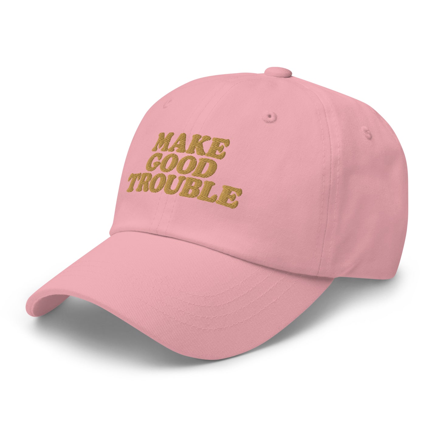 Side Front View Image: Side Front view of dad hat with bold “Make Good Trouble” gold embroidery - pink