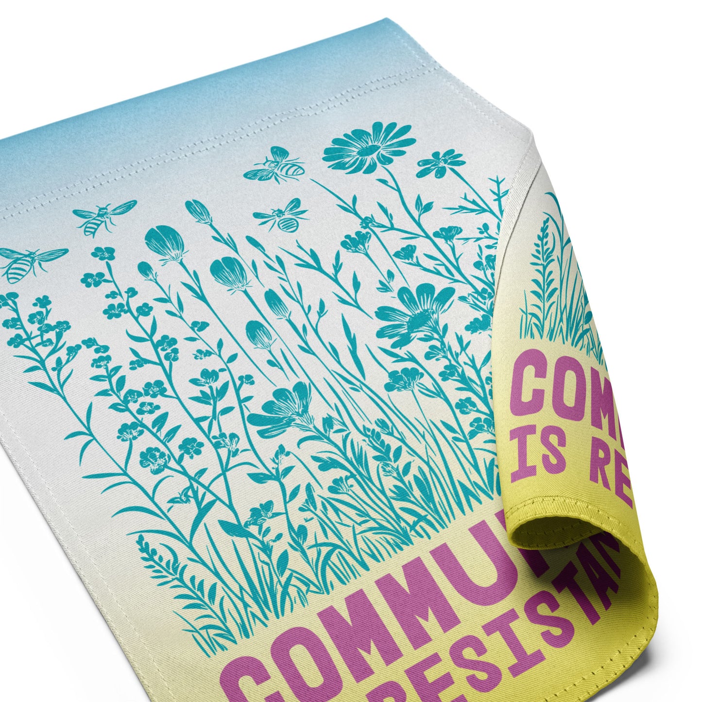 Zoomed view of the illustrated wildflowers and butterflies, with visible texture and color blending. A gentle, living metaphor for how communities flourish when they resist together.