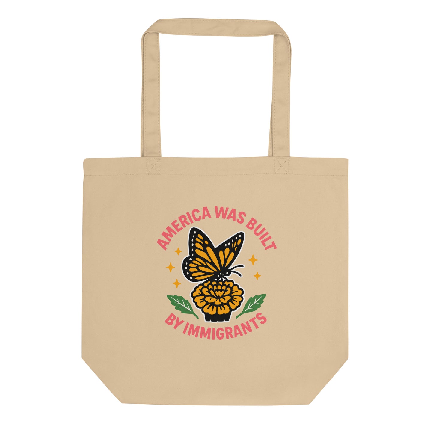 Natural cotton tote bag featuring “America Was Built by Immigrants” butterfly graphic, sustainable progressive design supporting immigrant rights.