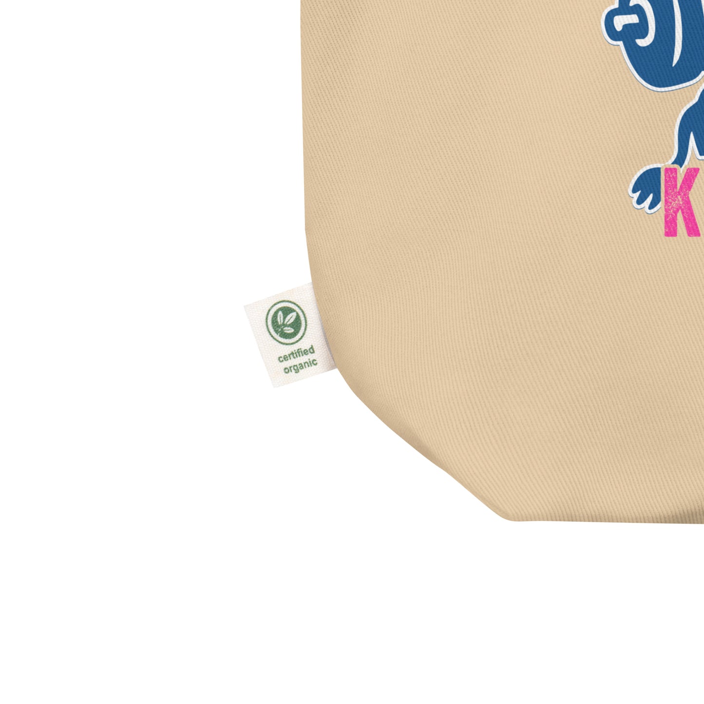 Close-up eco tote corner detail showing durable natural canvas fabric and partial donkey workout graphic in pink and blue political design.