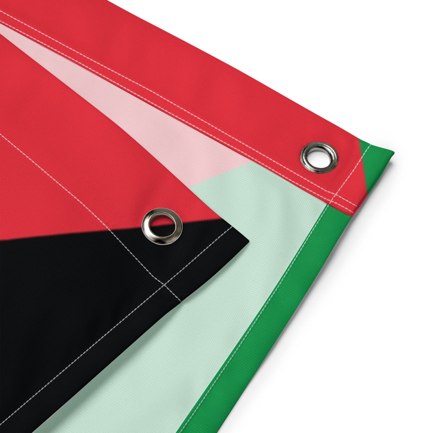 Detailed folded fabric view of Free Palestine wall flag with red, white, green, and black sections, Blue Wave USA activist décor.