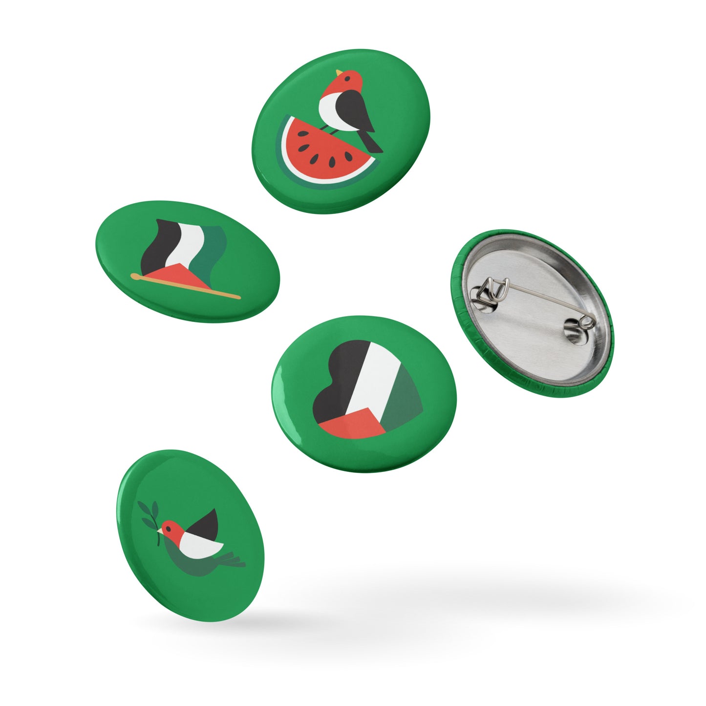 Scattered view of Free Palestine anti-war pin buttons with flag, bird, and peace-inspired designs on green base. Also the backside and angled display of Free Palestine pin buttons showing silver pin fasteners, Blue Wave USA activist accessories.