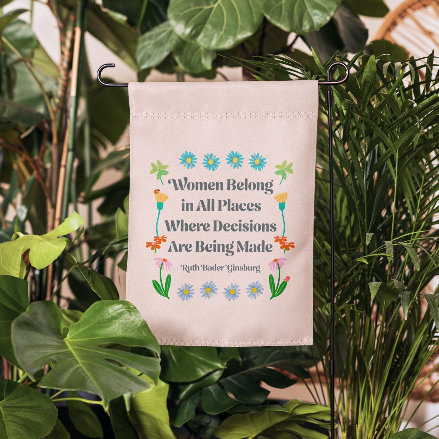 Front View Image: Women Belong In All Places Where Decisions Are Being Made Garden Flag with floral design.