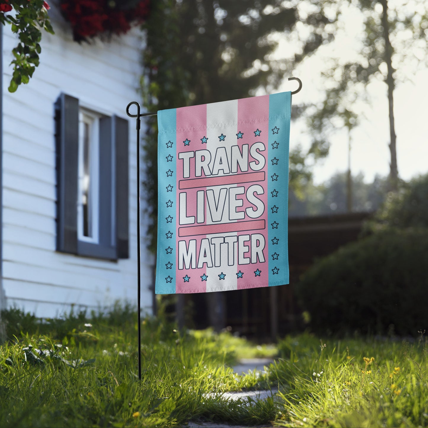 Lifestyle Image: Trans Lives Matter LGBTQ+ Garden Flag hanging proudly in a front yard