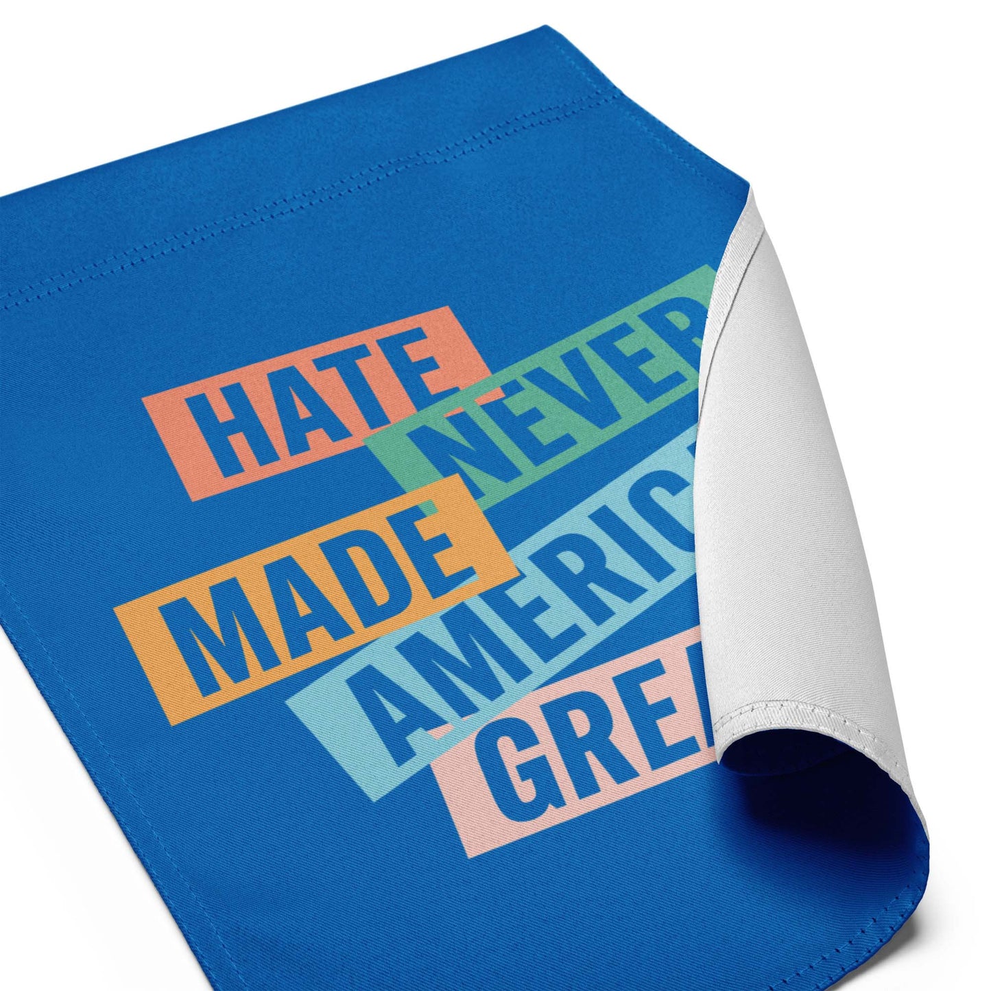 Detail View Image: Full display of the progressive Hate Never Made America Great garden flag
