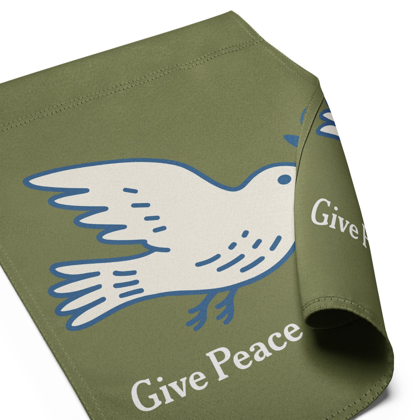 Folded olive green garden flag displaying partial dove peace symbol with visible hopeful peace wording in soft activist outdoor design.