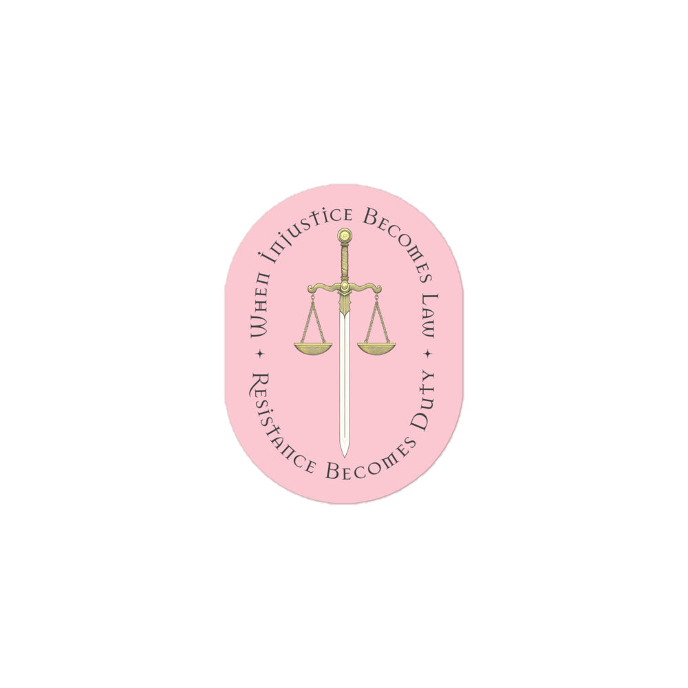 Front View Image: Vinyl sticker with scales and sword design.