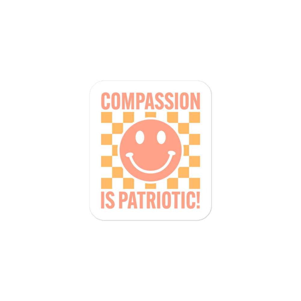 Front view of the Compassion Is Patriotic Smiley Face Sticker