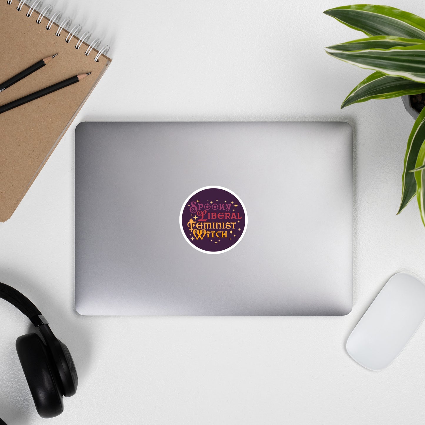 Front View Image: Spooky Liberal Feminist Witch Vinyl Sticker with bold witchy design