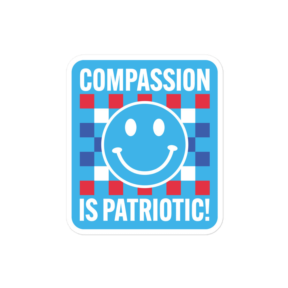 Front view of the Compassion Is Patriotic Patriotic Kindness Social Awareness Sticker featuring a bold red, white, and blue design.