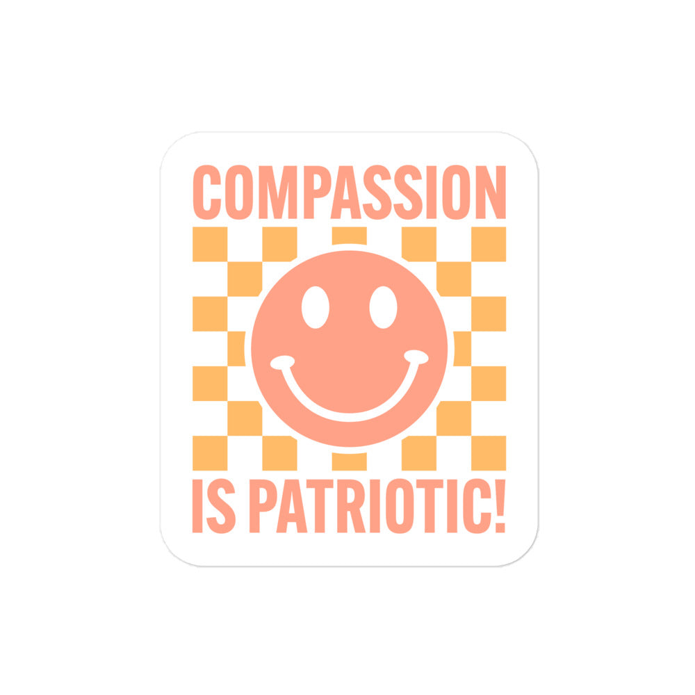 Front view of the Compassion Is Patriotic Smiley Face Sticker