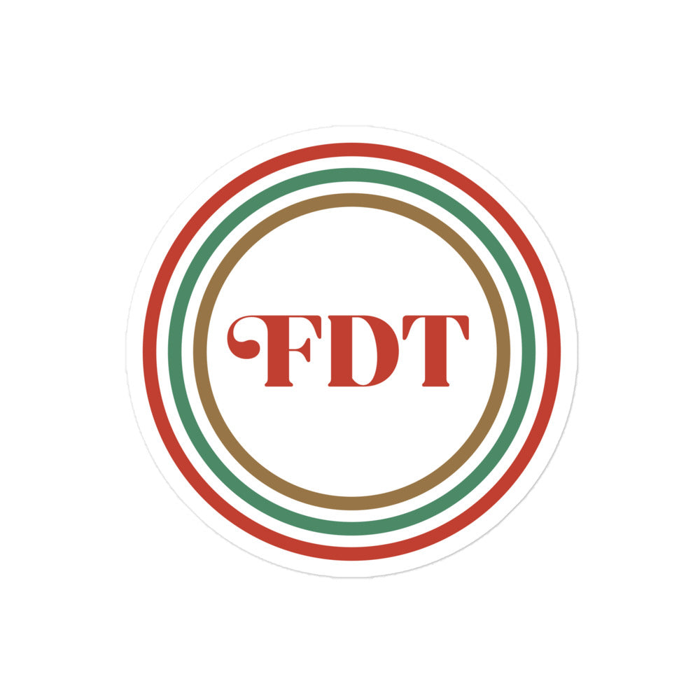 Front view of the FDT Anti-Trump Sticker with Christmas-themed bold lettering.