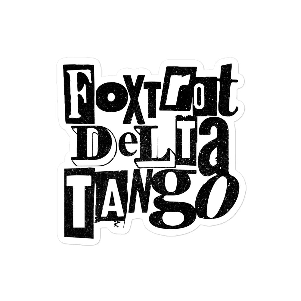 Grunge-style vinyl sticker featuring the "Foxtrot Delta Tango" anti-Trump message in a distressed design.