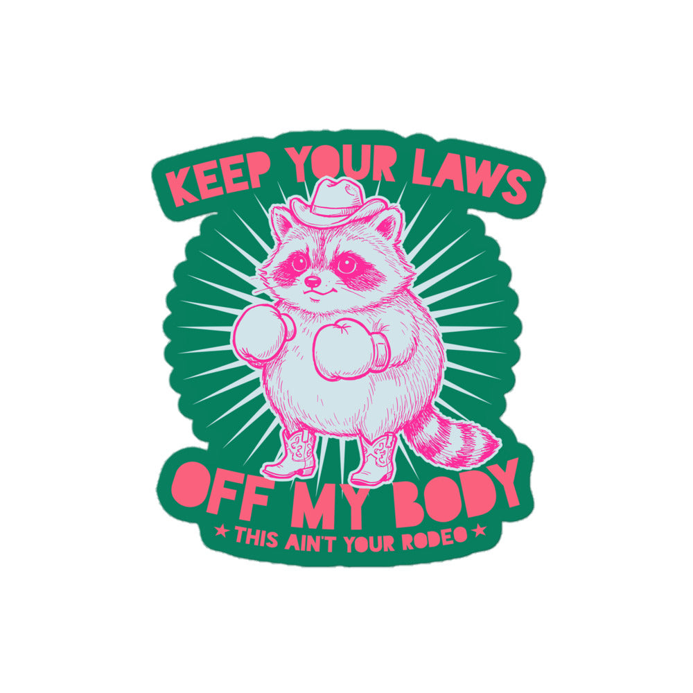 Blue Wave USA 4x4 sticker mockup displaying western raccoon illustration with “Keep Your Laws Off My Body” wording in playful justice-focused activist style.
