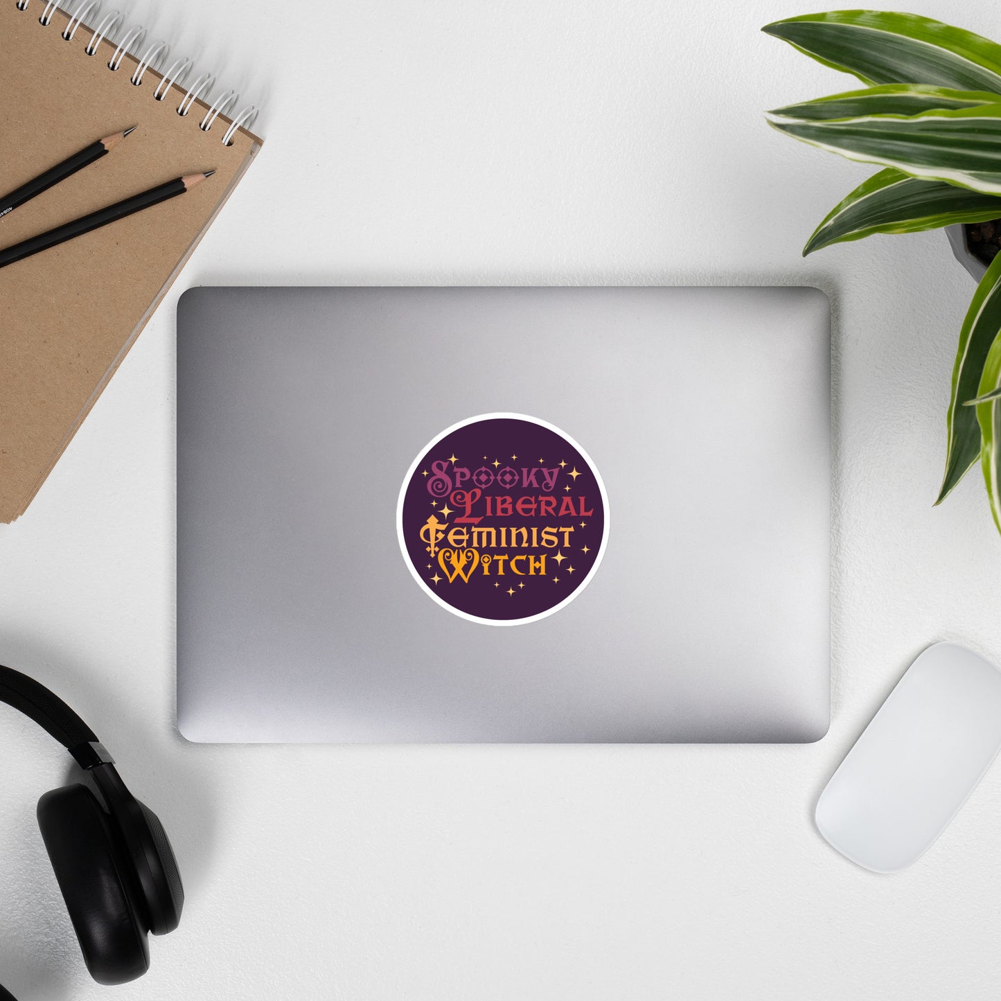 Front View Image: Spooky Liberal Feminist Witch Vinyl Sticker with bold witchy design