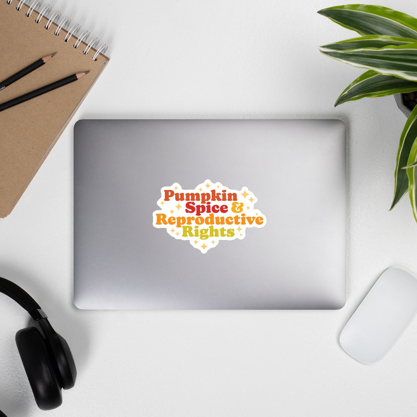 Lifestyle Image: Pumpkin Spice and Reproductive Rights Sticker displayed on a laptop.
