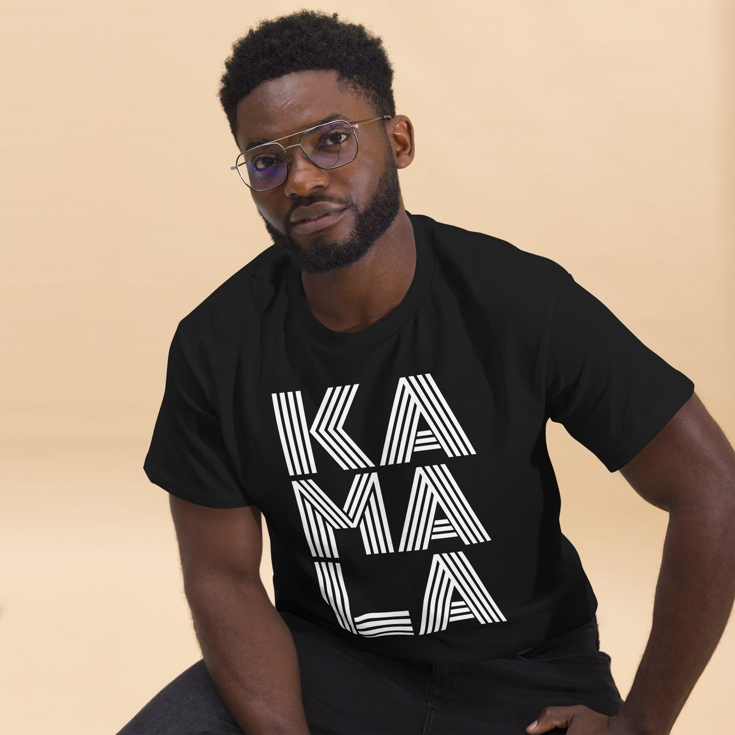 Black Kamala supporter wearing the Retro KAMALA Harris Unisex Classic Tee