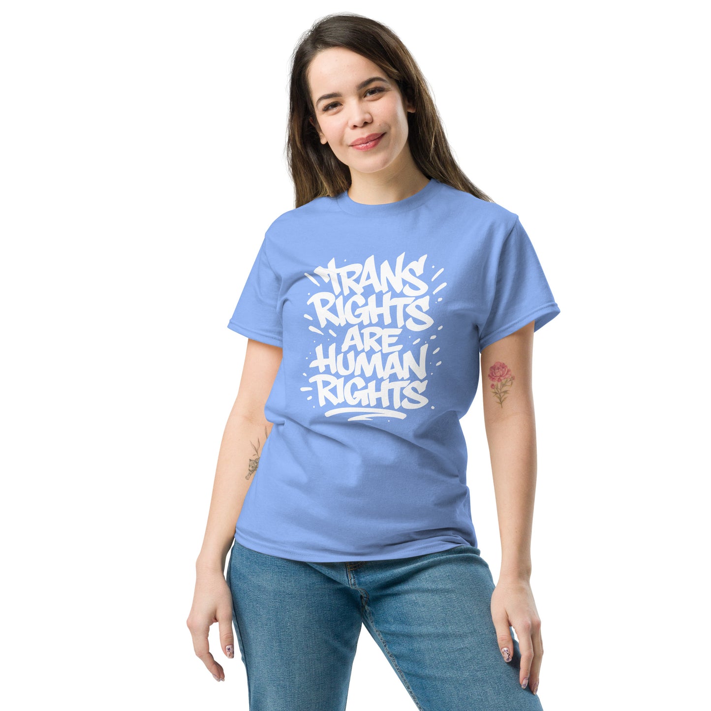 Female activist wearing the "Trans Rights Are Human Rights" LGBTQ+ Activist Slogan Unisex Classic Tee - Light Blue