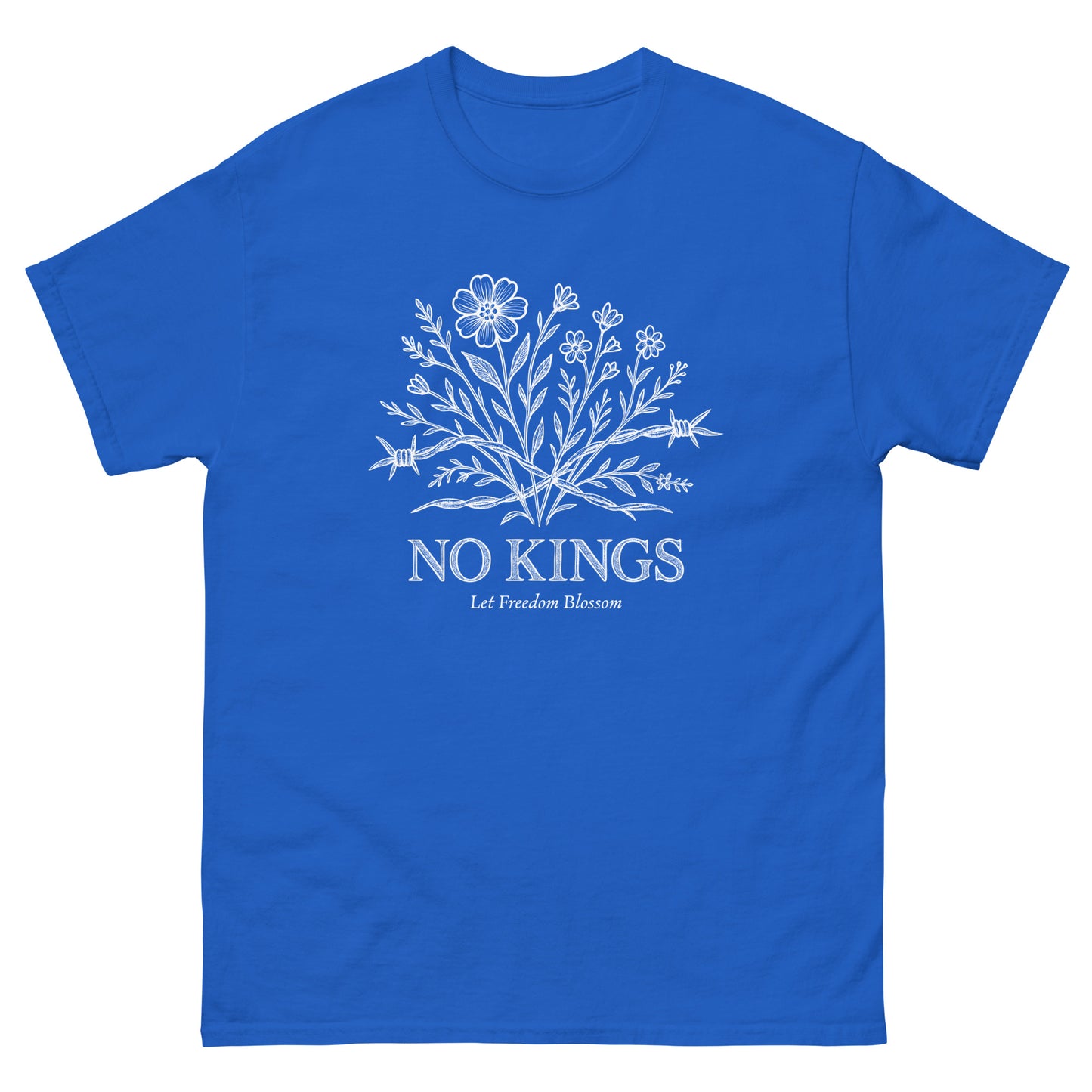 Front View Image: Bluetee with white wildflower and barbed wire bouquet above “No Kings – Let Freedom Blossom”