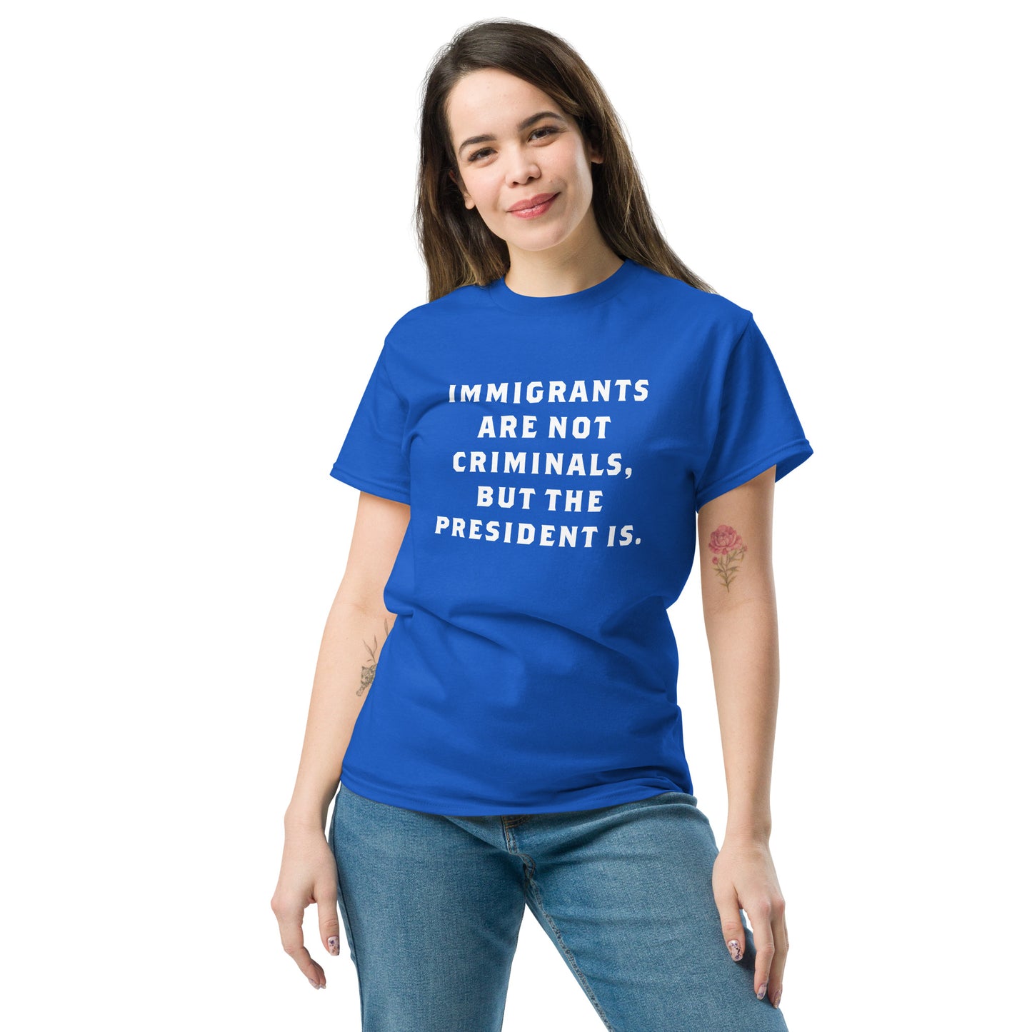 Female protester wearing the "Immigrants Are Not Criminals" Anti-Trump Anti-ICE tee, making a powerful statement for human rights & accountability
