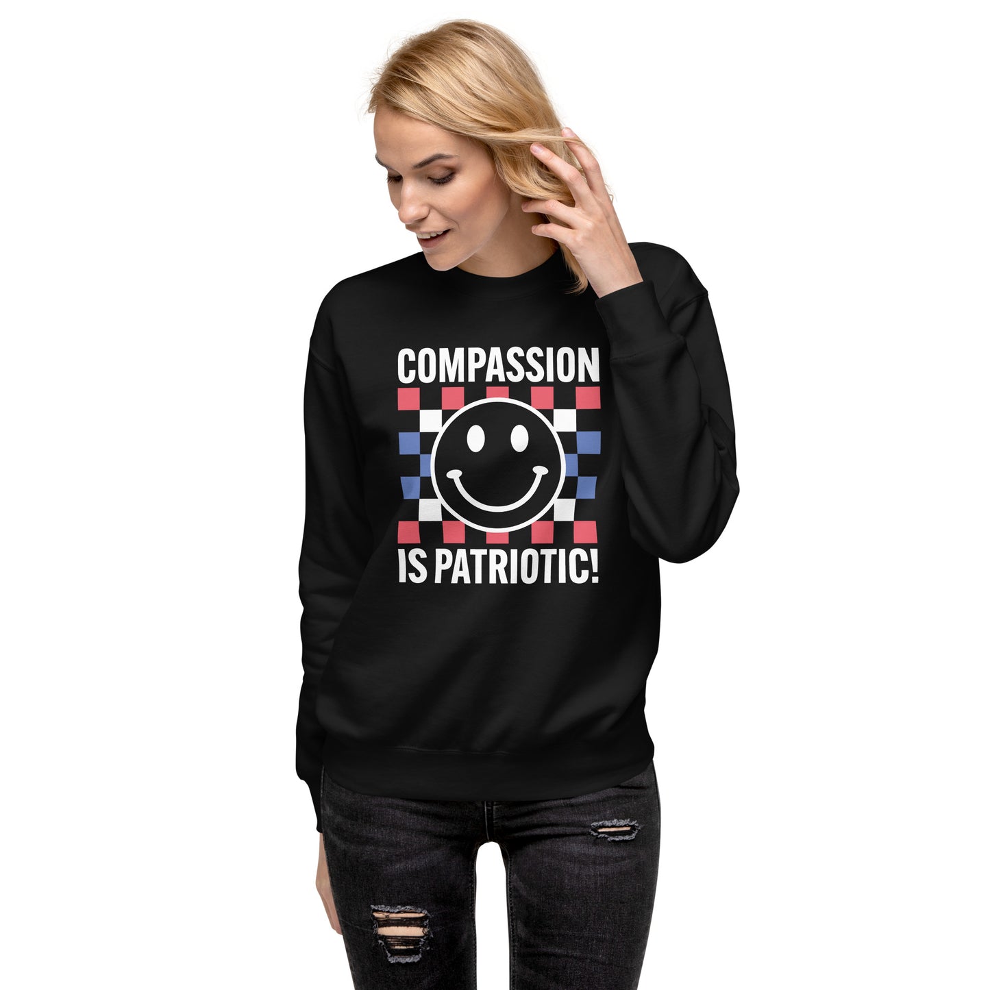 Person wearing the Compassion Is Patriotic sweatshirt