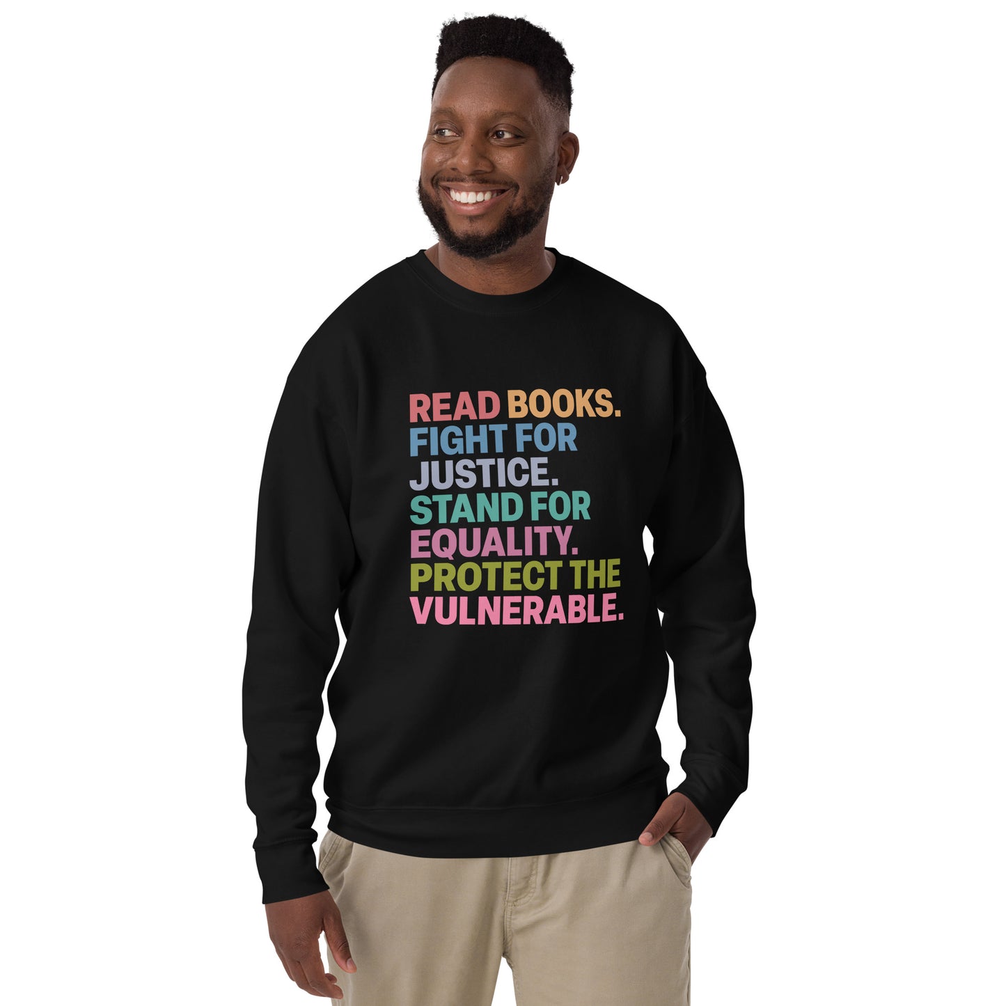 Lifestyle Image: Model wearing the social justice sweatshirt with “Read Books. Fight For Justice. Stand For Equality. Protect The Vulnerable.” text