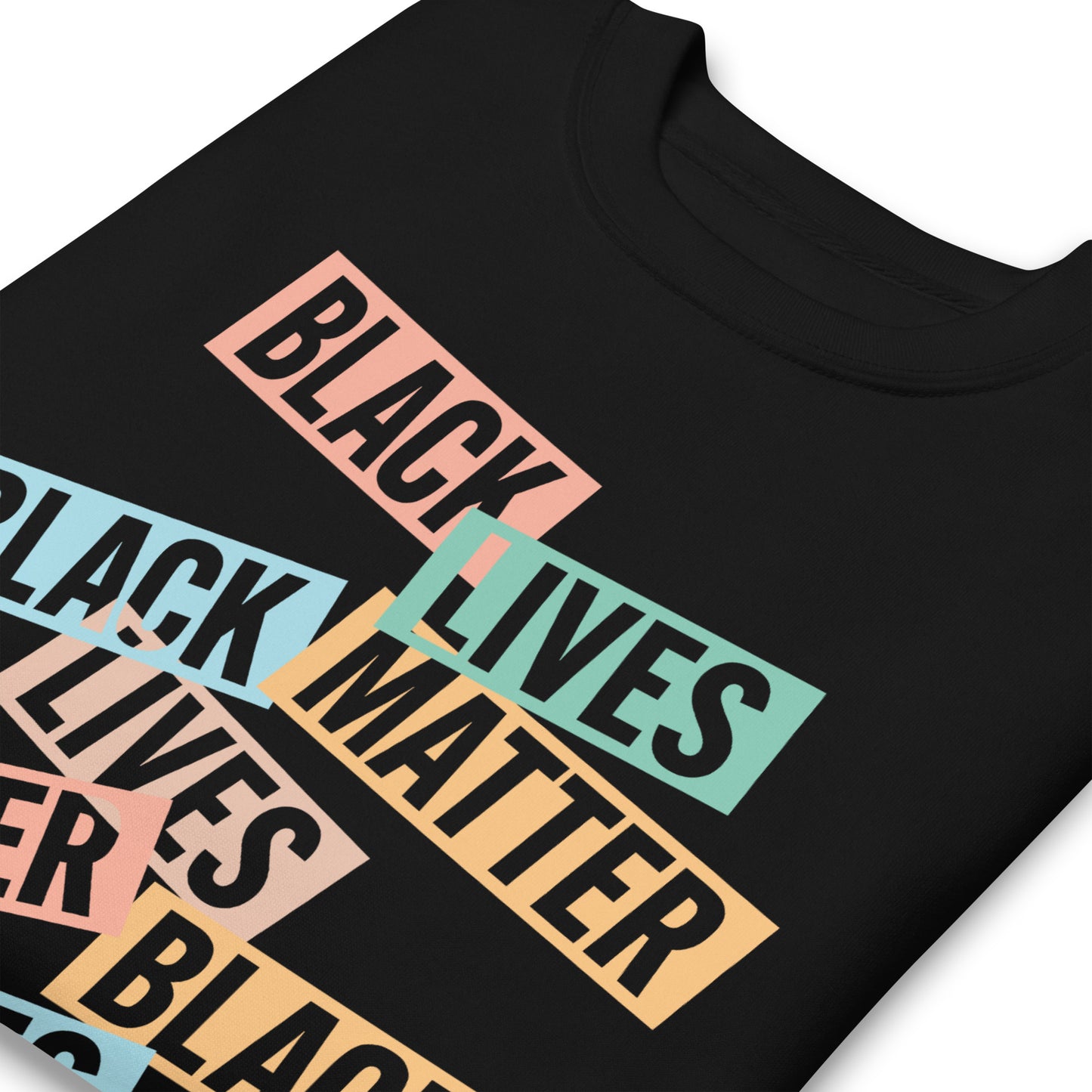 Close-Up of Design: Black Lives Matter slogan close-up on sweatshirt.