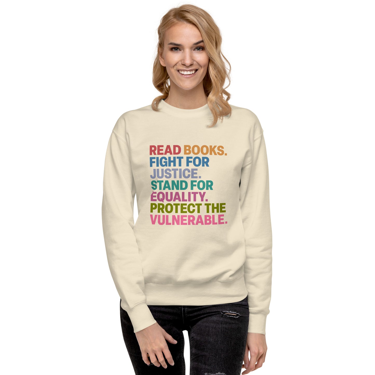 Lifestyle Image: Model wearing the social justice sweatshirt with “Read Books. Fight For Justice. Stand For Equality. Protect The Vulnerable.” text