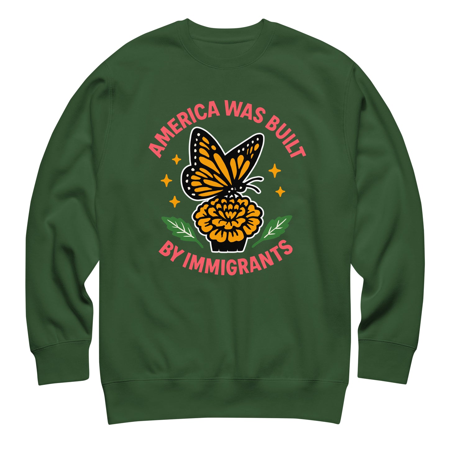 Forest green sweatshirt with butterfly and marigold design symbolizing immigrant strength and hope.