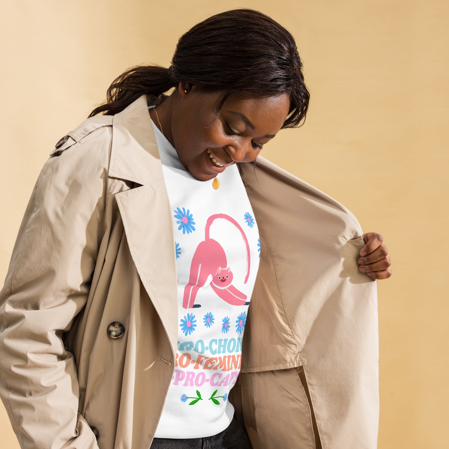Person lounging in the Pro-Choice Pro-Feminism Pro-Cats Premium Sweatshirt.
