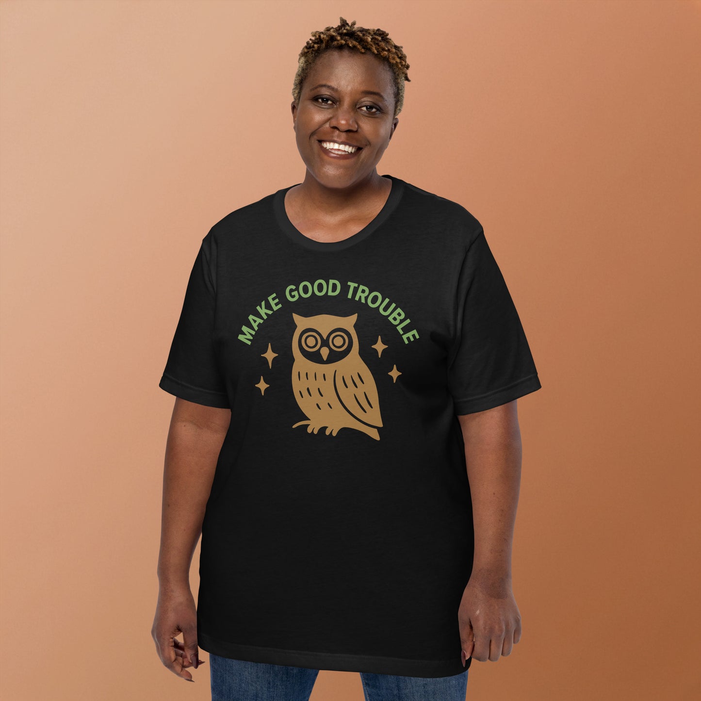 Lifestyle Image: Black woman wearing the Make Good Trouble owl protest shirt.